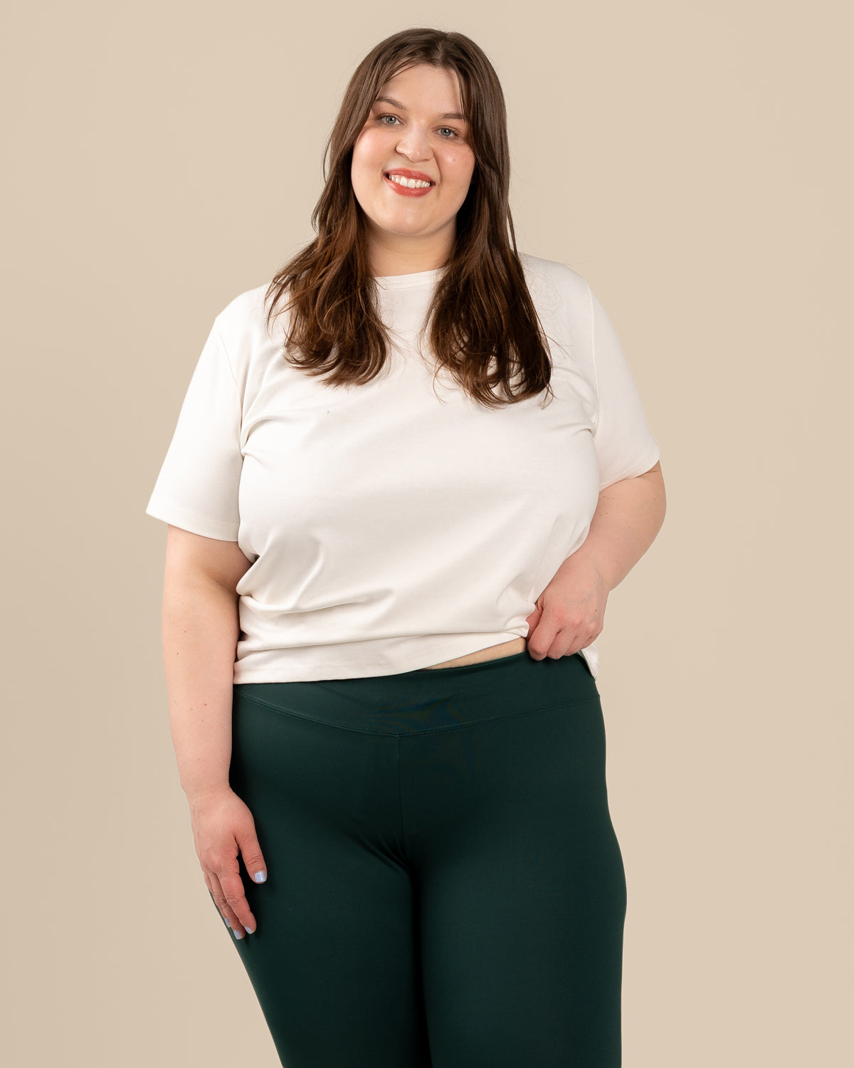 Tummanvihreät leggingsit